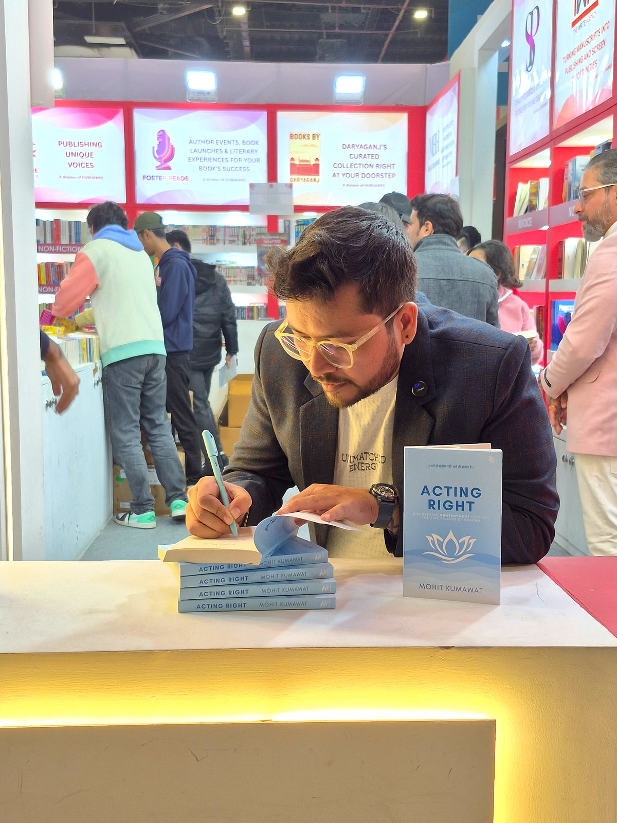 Mohit Kumawat signing copies of Acting Right at the Delhi Book Fair